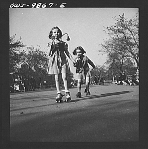 New York, New York. Janet and Marie Winn [or Wynn], Czech-American children, go roller-skating in Central Park