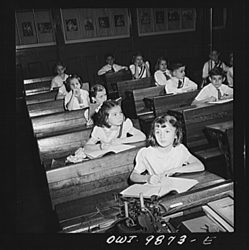 New York, New York. Janet Winn [or Wynn], a Czech-American child, (second from front), copying lesson from the blackboard in third grade in a public school
