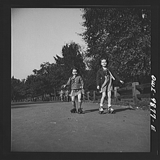 Untitled photo, possibly related to: New York, New York. Janet and Marie Winn [or Wynn], Czech-American children, go roller-skating in Central Park