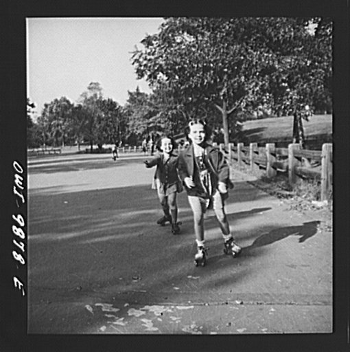 New York, New York. Janet and Marie Winn [or Wynn], Czech-American children, go roller-skating in Central Park