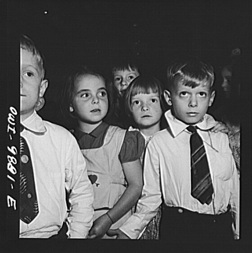 New York, New York. First graders in public school singing the Star Spangled Banner. Marie Winn [or Wynn], a Czech-American child is second from the left