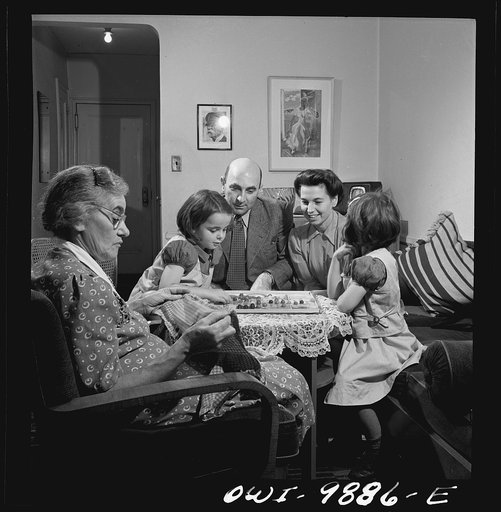 New York, New York. Dr. and Mrs. Winn [or Wynn], Janet and Marie, a Czech-American family, playing Chinese checkers while their grandmother knits