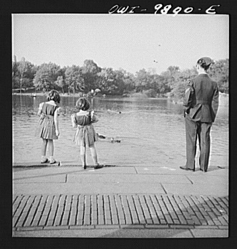 New York, New York. Janet and Marie Wynn [or Winn], Czech-American children, feeding the ducks in Central Park