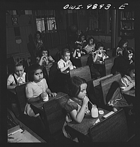 New York, New York. First graders in public school having morning milk. Marie Winn [or Wynn], a Czech-American child is in the foreground
