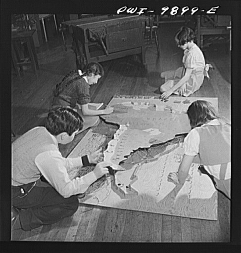 New York, New York. The Lincoln School of Teachers' College, Columbia University. Sixth graders working on an illuminated map of South America, showing resources