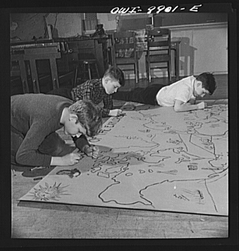 New York, New York. The Lincoln School of Teachers' College, Columbia University. Putting the finishing touches on a map of the world, showing routes of early explorers