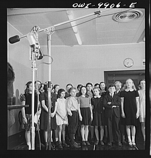 New York, New York. The Lincoln School of Teachers' College, Columbia University. Elementary school students singing America the Beautiful during a radio broadcast to Latin America under the auspices of the Coordinator of Inter-American Affairs