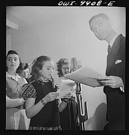 New York, New York. The Lincoln School of Teachers' College, Columbia University. Girl announcing a radio broadcast to Latin America in Spanish under the auspices of the Coordinator of Inter-American Affairs. The announcer is watching for signals