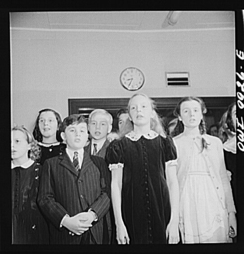New York, New York. The Lincoln School of Teachers' College, Columbia University. Elementary school students singing America the Beautiful during a radio broadcast to Latin America under the auspices of the Coordinator of Inter-American Affairs