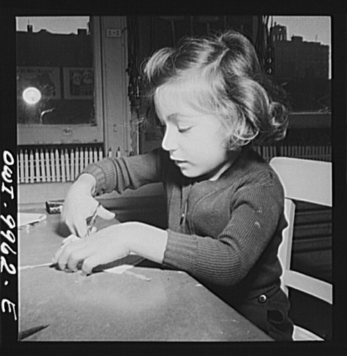 New York, New York. Children's Colony, a school for refugee children administered by a Viennese. French refugee child learning to sew