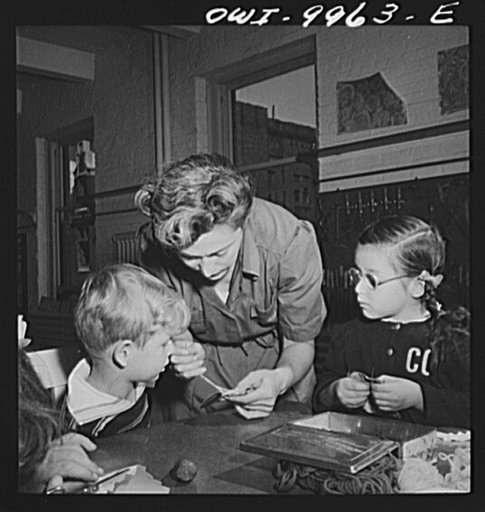 New York, New York. Children's Colony, a school for refugee children administered by a Viennese. French refugee child learning to sew