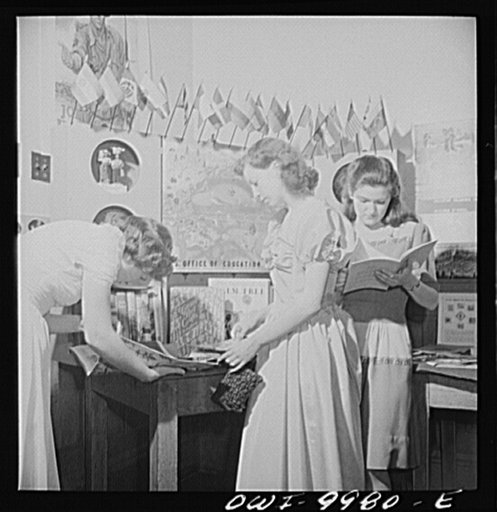 Washington, D.C. Under the auspices of the Bureau of University Travel and the National Capital School Visitors' Council, over 200 high school students chosen for their intellectual alertness visited Washington for a week. Students examining the Pan-American exhibit at American University