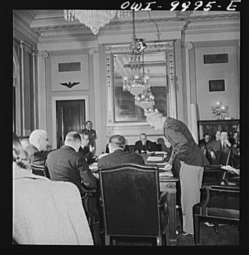 Washington, D.C. Under the auspices of the Bureau of University Travel and the National Capital School Visitors' Council, over 200 high school students chosen for their intellectual alertness visited Washington for a week. Students witness a hearing of the Naval Affairs Committee. Senator Walsh, cha