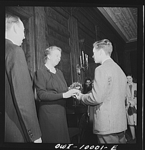 Washington, D.C. Under the auspices of the Bureau of University Travel and the National Capital School Visitors' Council, over 200 high school students chosen for their intellectual alertness visited Washington for a week. At the White House, Mrs. Roosevelt was presented with a bouquet by one of the