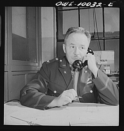 Washington, D.C. Colonel A.I. Ennis, chief of United States Army Air Corps Office of Public Relations at his desk in the munitions building