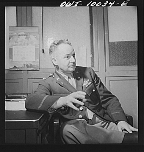 Washington, D.C. Colonel A.I. Ennis, chief of United States Army Air Corps Office of Public Relations at his desk in the munitions building