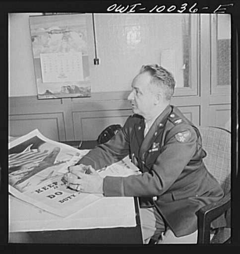 Washington, D.C. Colonel A.I. Ennis, chief of United States Army Air Corps Office of Public Relations at his desk in the munitions building