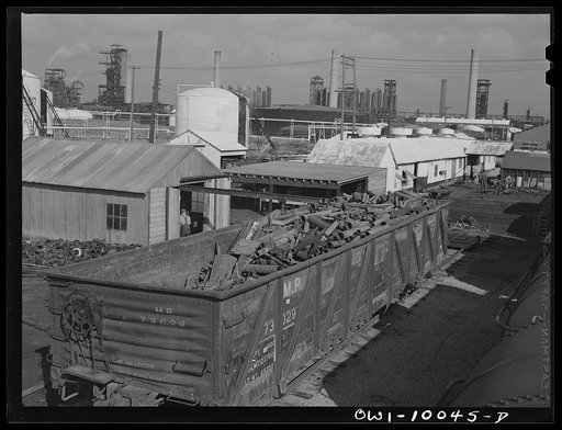 Tulsa, Oklahoma. Car being loaded with scrap iron at the Mid-continent refinery