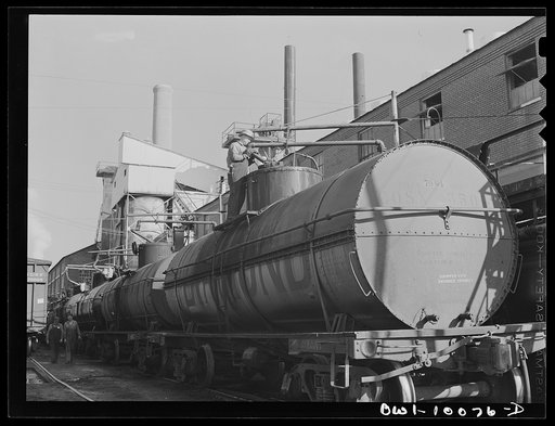 Tulsa, Oklahoma. Loading a tank car with lubricating oil at the Mid-continent refinery