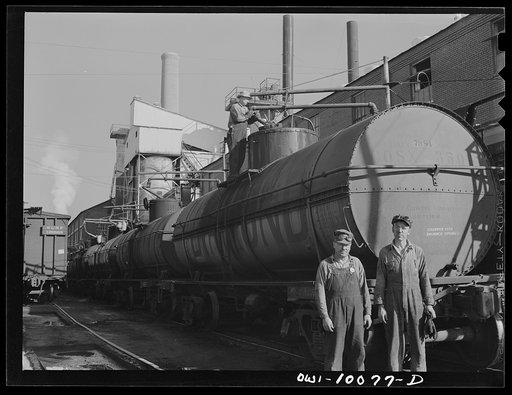 Tulsa, Oklahoma. Loading a tank car with lubricating oil at the Mid-continent refinery