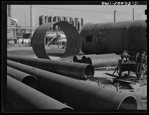 Tulsa, Oklahoma. Salvaged pipe and tower shells at the Mid-continent refinery