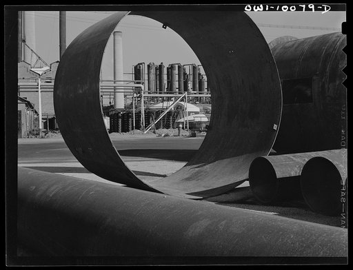 Tulsa, Oklahoma. Salvaged pipe and tower shells at the Mid-continent refinery