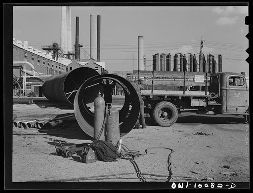 Untitled photo, possibly related to: Tulsa, Oklahoma. Tower sections made from salvaged material at the Mid-continental refinery