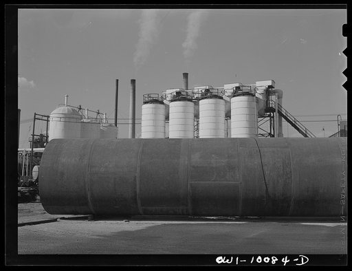 Tulsa, Oklahoma. Assembled tower sections and chiller tanks at the Mid-continent refinery