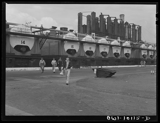 Untitled photo, possibly related to: Tulsa, Oklahoma. Workers leaving the grounds at the noon hour at the Mid-continent refinery