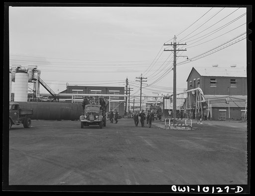 Untitled photo, possibly related to: Tulsa, Oklahoma. Assembled tower sections and chiller tanks at the Mid-continent refinery