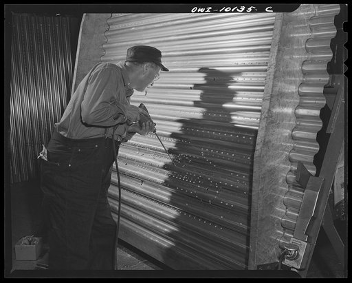 De Soto bomber plant. Detroit, Michigan. Drilling operation on the center wing section