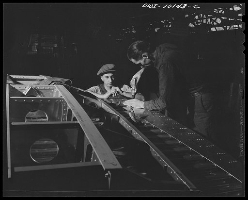 De Soto bomber plant. Detroit, Michigan. A drilling operation on the center wing section