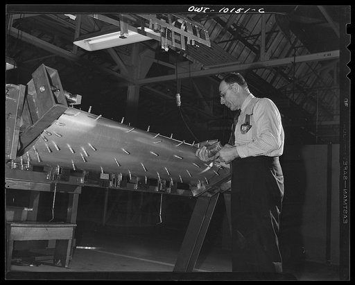 De Soto bomber plant. Detroit, Michigan. Cleco clamps holding various parts together in a sub-assembly fixture until they are all riveted