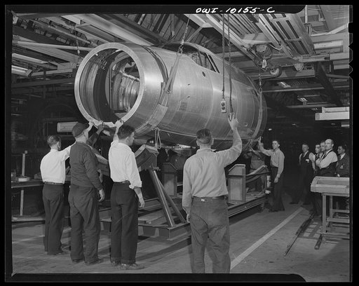 De Soto bomber plant, Detroit, Michigan. Loading final assembly sections onto trucks