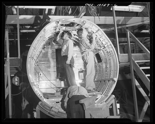 De Soto bomber plant, Detroit, Michigan. Inspectors checking a center section