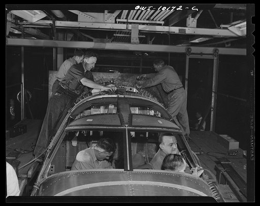 De Soto bomber plant, Detroit, Michigan. Final operation in major assembly fixture of the nose section