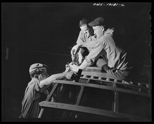 De Soto bomber plant, Detroit, Michigan. Drilling operation in the center wing section