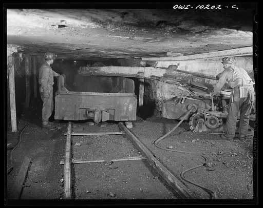 Pittsburgh, Pennsylvania (vicinity). Montour no. 4 mine of the Pittsburgh Coal Company. Mechanical loader filling mine car with car