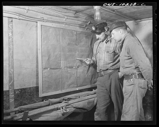 Pittsburgh, Pennsylvania (vicinity). Montour no. 4 mine of the Pittsburgh Coal Company. Chief dispatcher checking over a map in the dispatcher's booth
