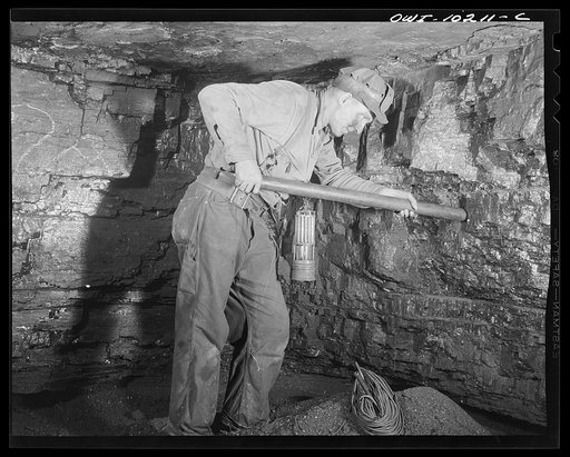 Pittsburgh, Pennsylvania (vicinity). Montour no. 4 mine of the Pittsburgh Coal Company. Placing a Cordox shell in place before blasting