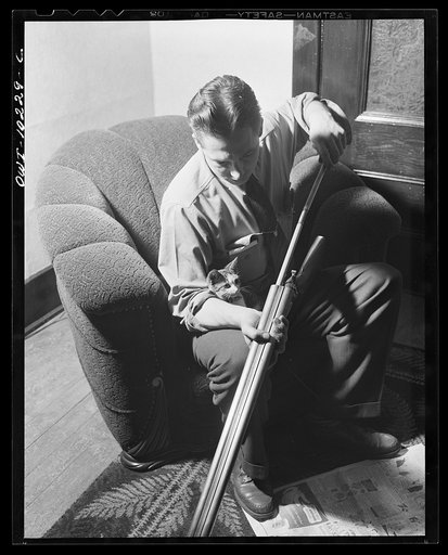 Untitled photo, possibly related to: Pittsburgh, Pennsylvania (vicinity). Montour no. 4 mine of the Pittsburgh Coal Company. Assistant superintendent getting ready for a hunting trip.