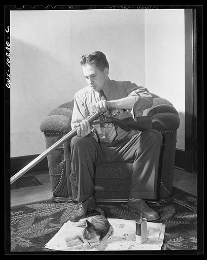 Untitled photo, possibly related to: Pittsburgh, Pennsylvania (vicinity). Montour no. 4 mine of the Pittsburgh Coal Company. Assistant superintendent getting ready for a hunting trip.