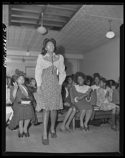 Washington, D.C. Young girl being converted at the Church of God in Christ