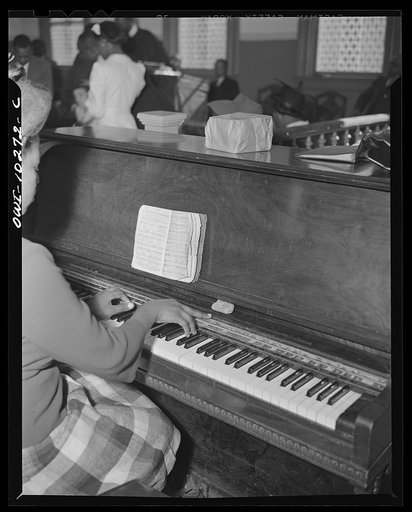 Untitled photo, possibly related to: Washington, D.C. Pianist who accompanies the choir at the Church of God in Christ
