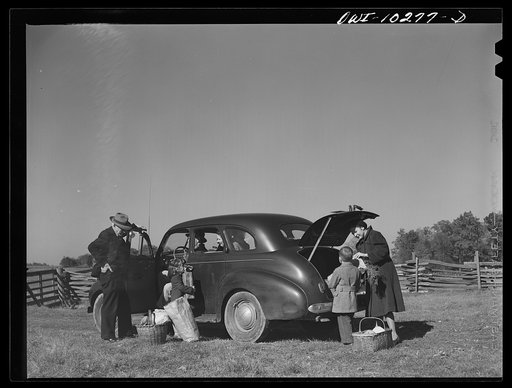 Montgomery County, Maryland. Farmers sharing a car on market day