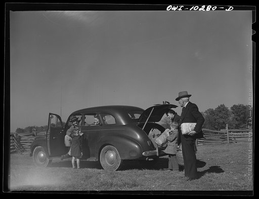 Montgomery County, Maryland. Farmers sharing a car on market day
