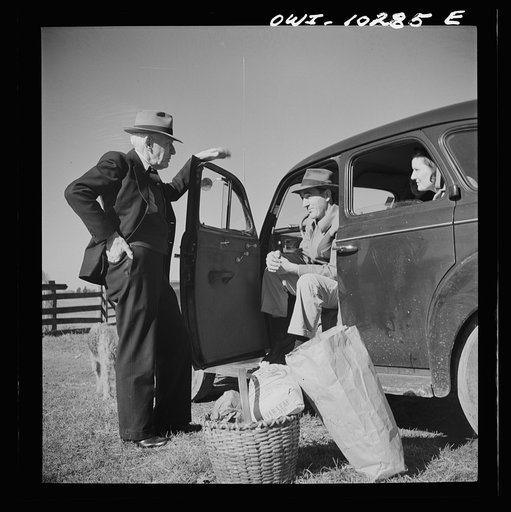 Untitled photo, possibly related to: Montgomery County, Maryland. Farmers sharing a car on market day