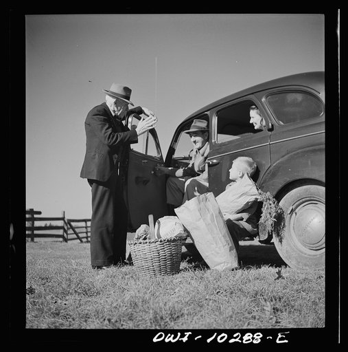 Montgomery County, Maryland. Farmers sharing a car on market day