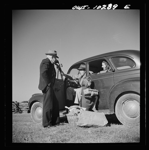 Untitled photo, possibly related to: Montgomery County, Maryland. Farmers sharing a car on market day