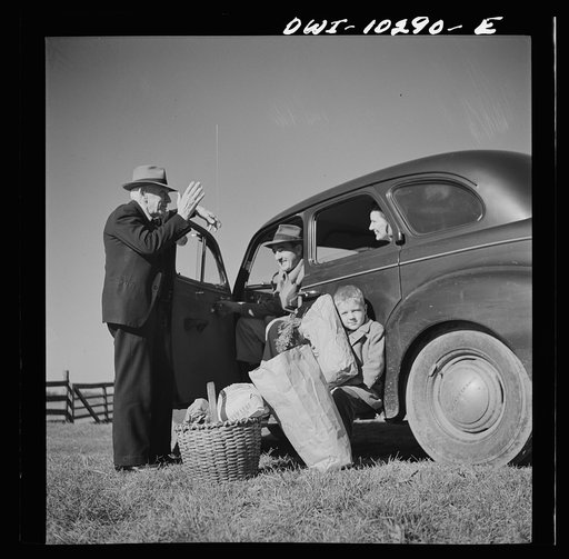Untitled photo, possibly related to: Montgomery County, Maryland. Farmers sharing a car on market day